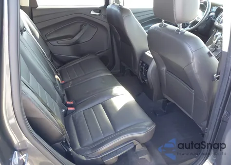 2015 Ford Escape Titanium z USA, uszkodzony, nr VIN 1FMCU9JX9FUB77371